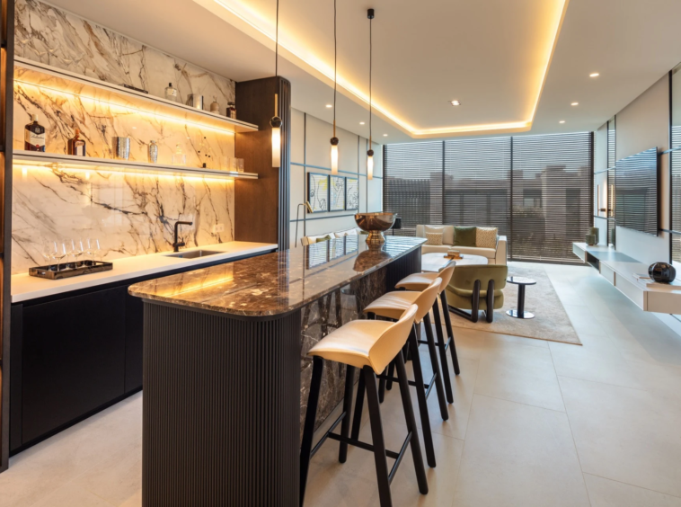 Illuminated bar and seating area on the lower level