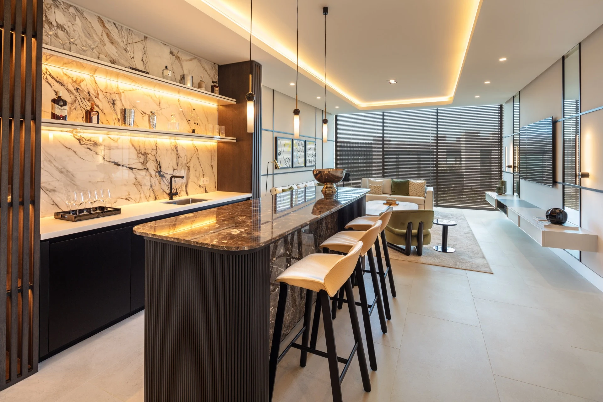 Illuminated bar and seating area on the lower level