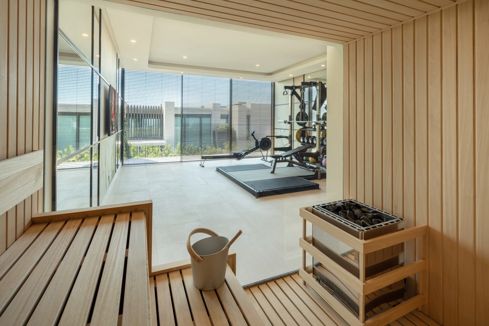 Timber sauna overlooking the adjoining gym