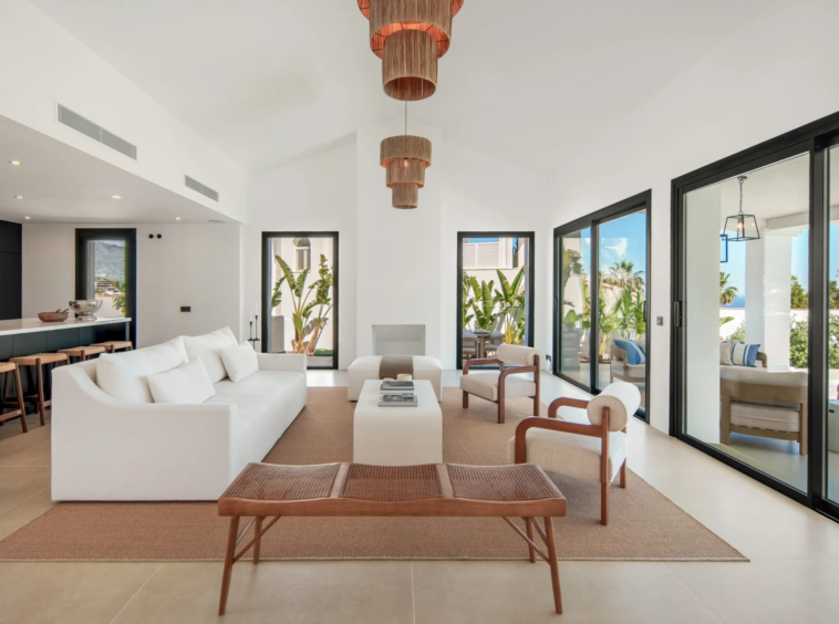 Living room with sliding doors opening to the terrace