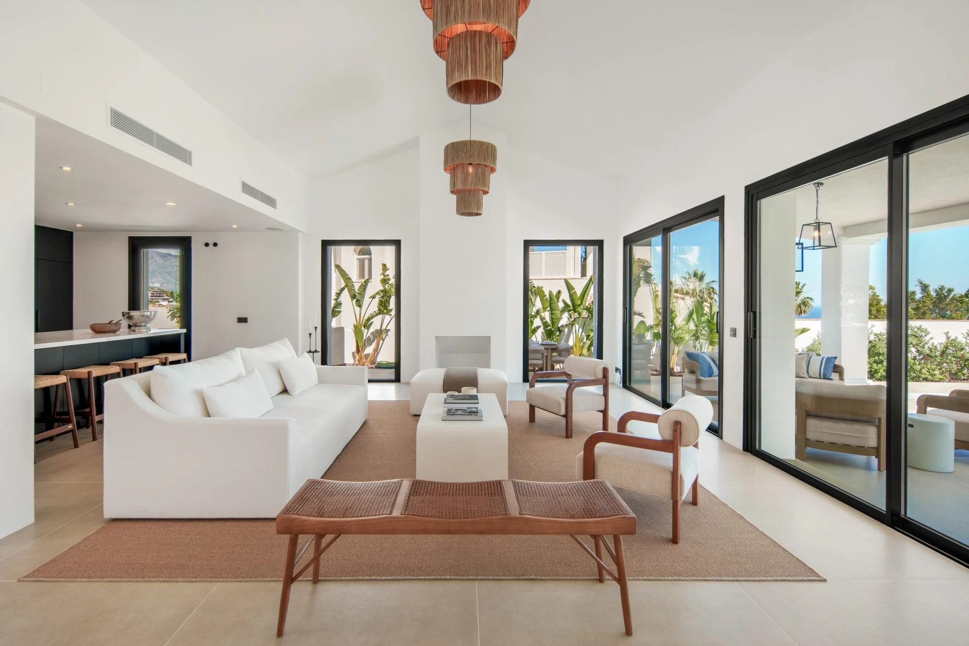 Living room with sliding doors opening to the terrace