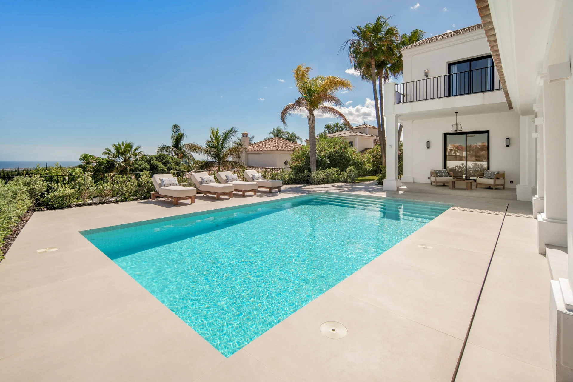Pool terrace and Mediterranean outlook beside the villa