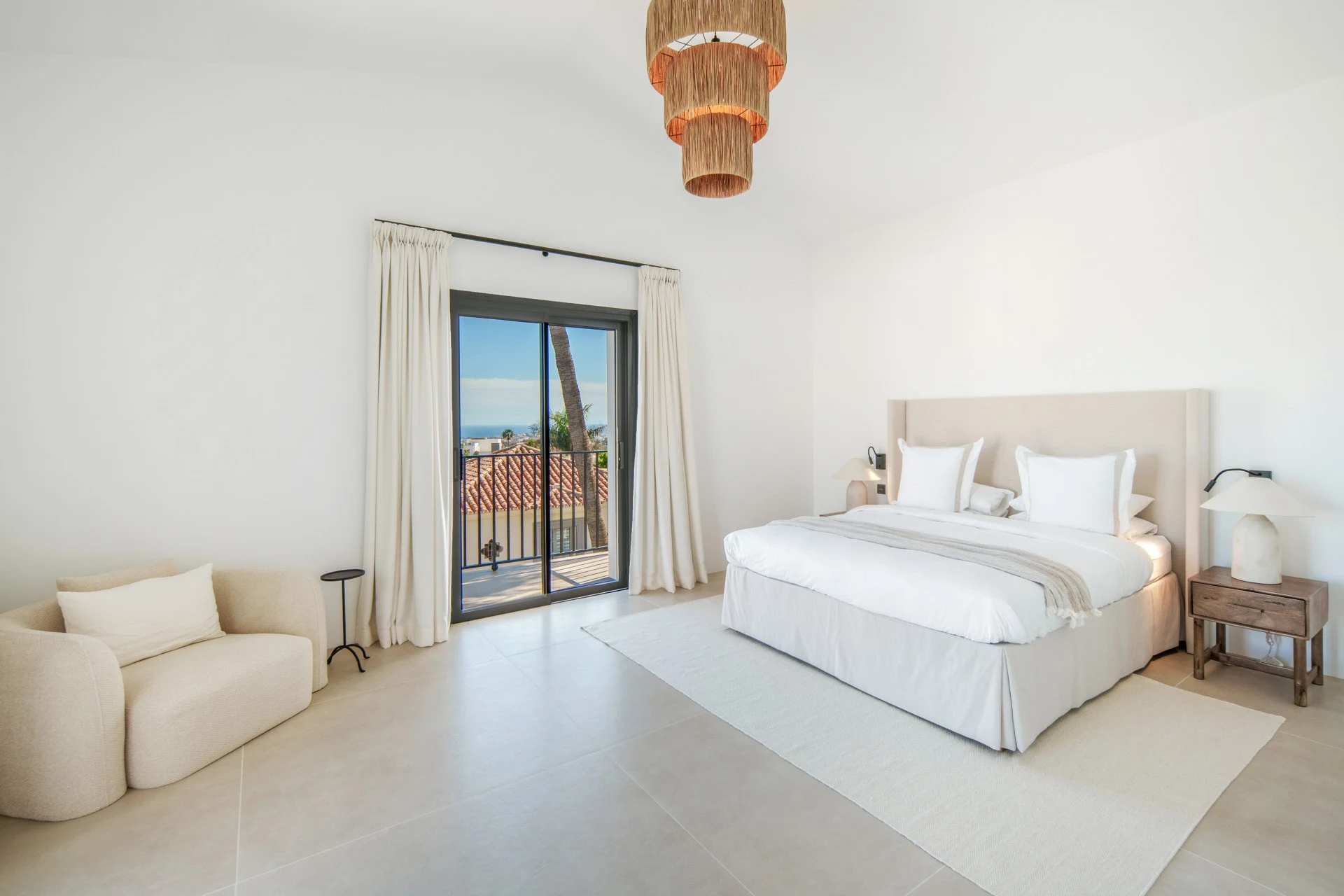 Upper-floor bedroom with balcony access