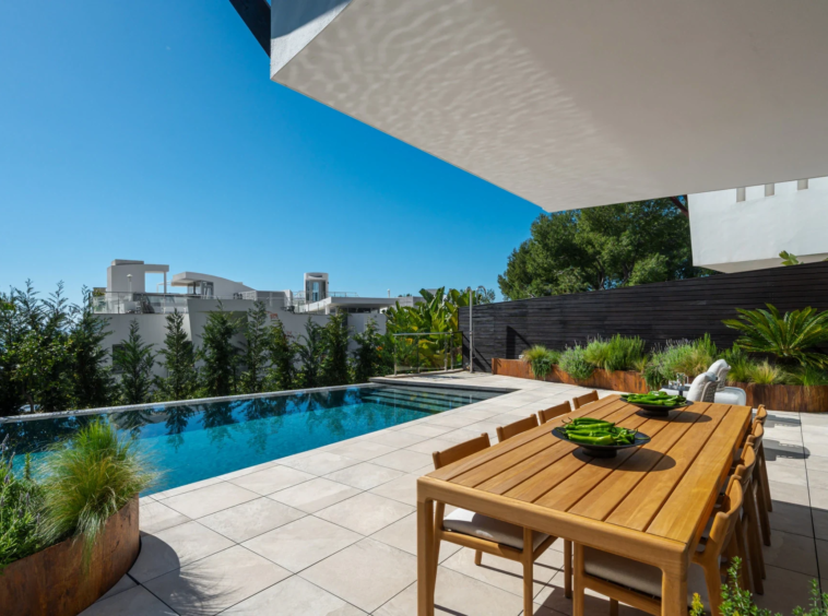 Poolside terrace with outdoor dining area