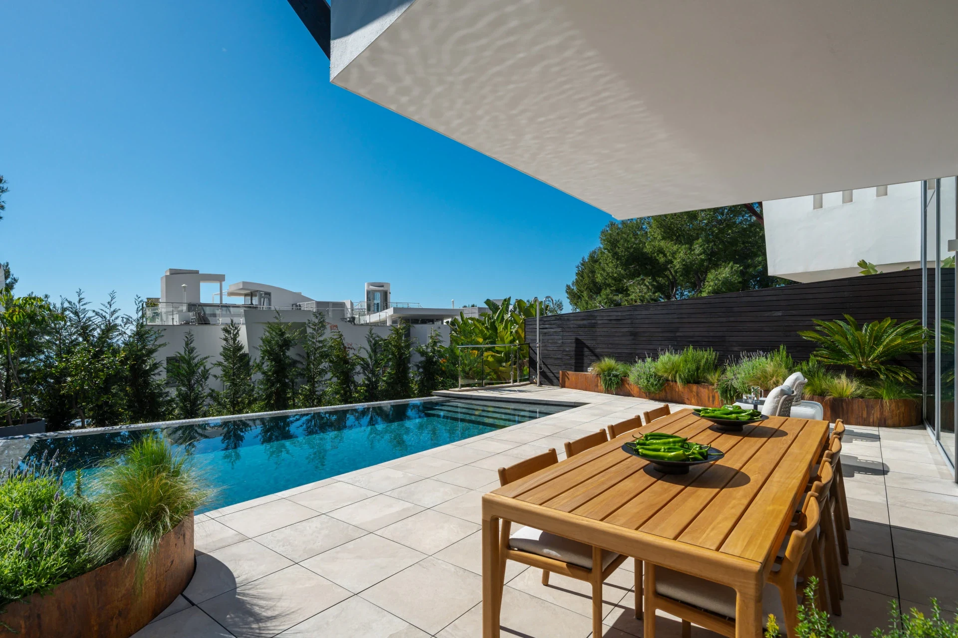Poolside terrace with outdoor dining area