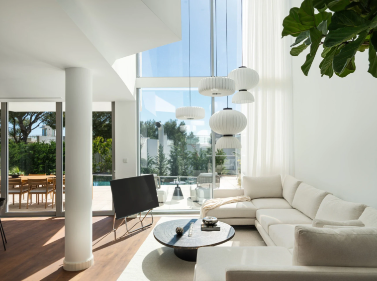 Bright living room opening onto the private terrace