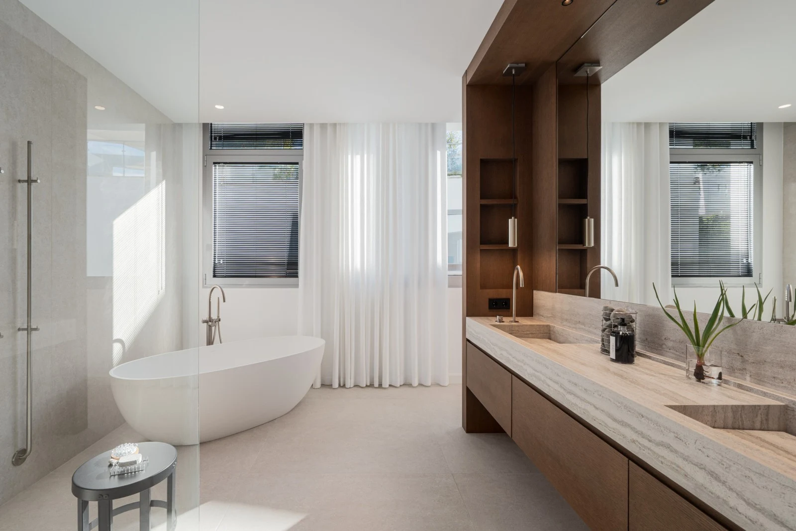 Bathroom with freestanding bathtub and double vanity