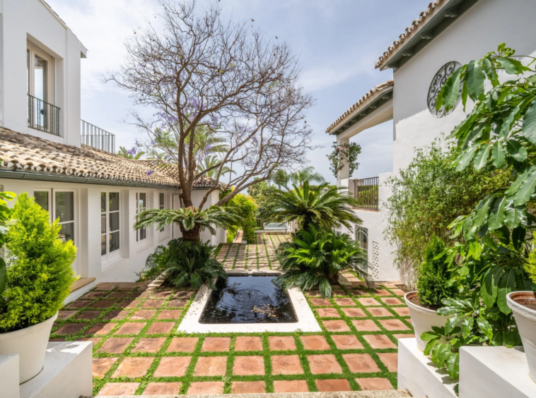 Landscaped courtyard with a central water feature