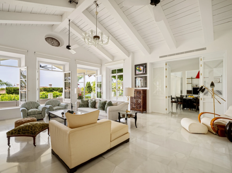 Bright vaulted living room opening to the garden
