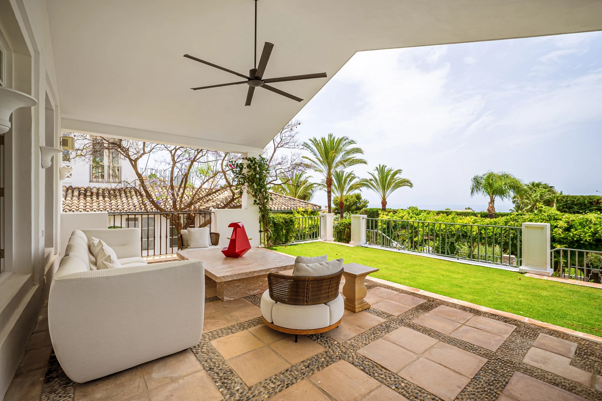 Shaded outdoor lounge with open views