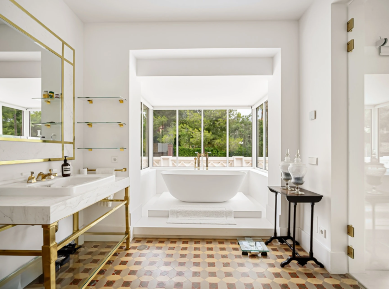 Bathroom with twin basins and a bathtub