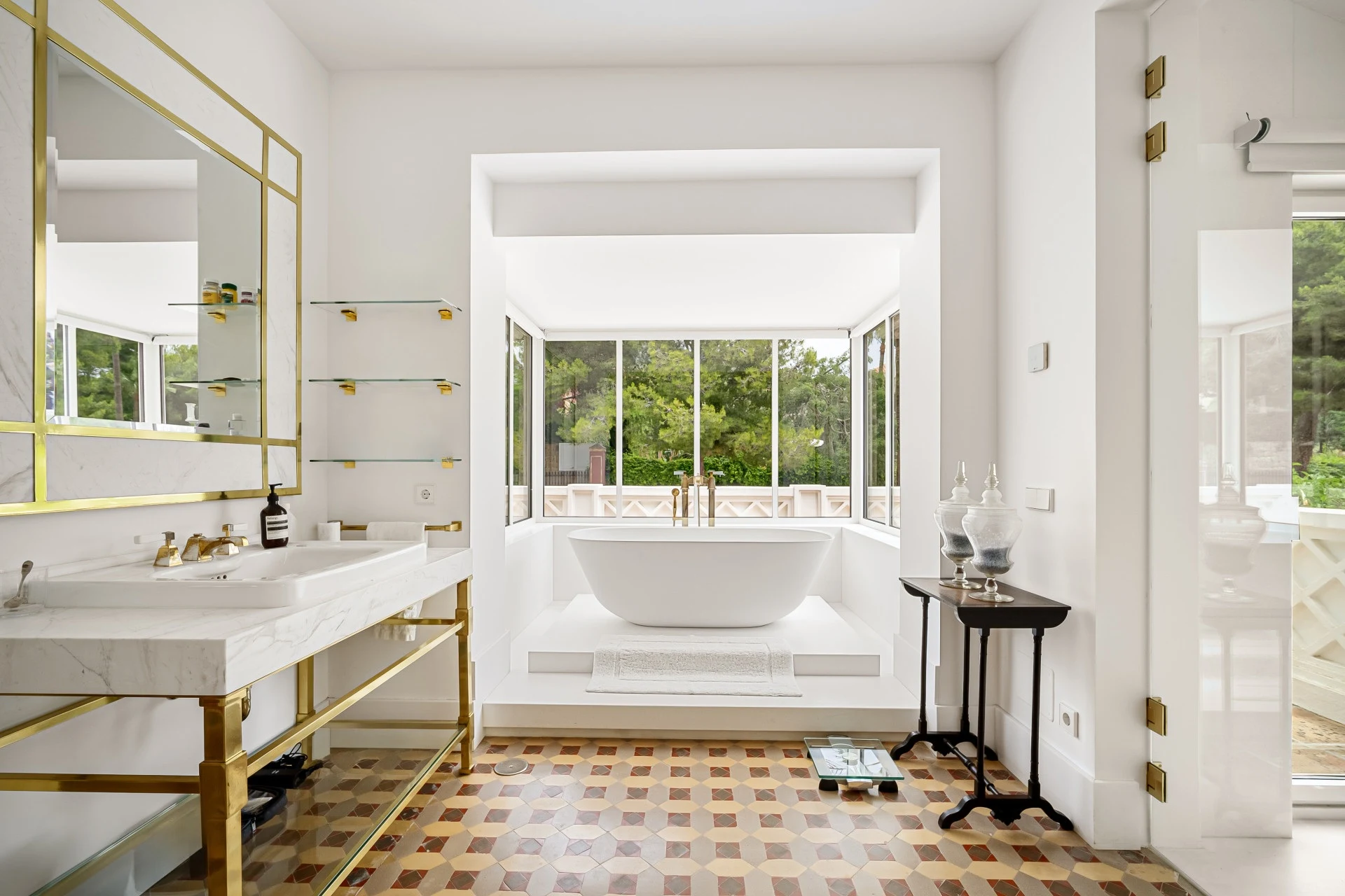 Bathroom with twin basins and a bathtub