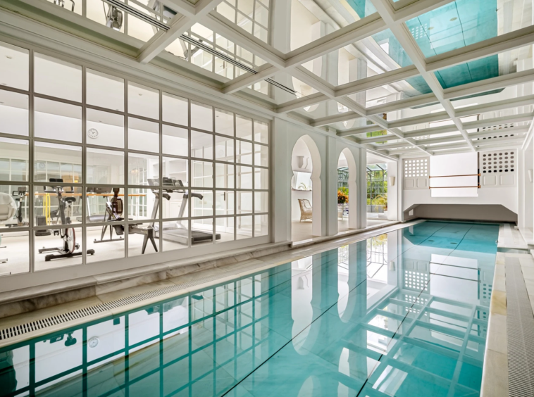 Indoor swimming pool beneath a glazed roof