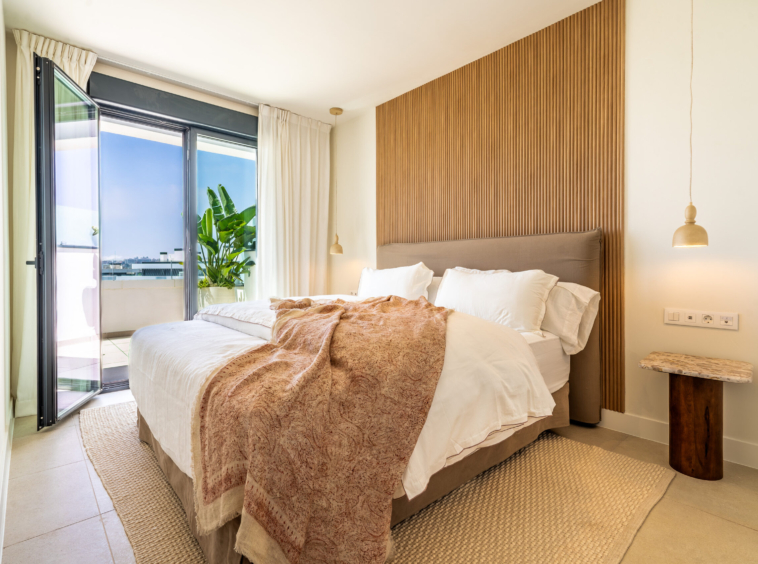 Representative main bedroom opening onto a terrace