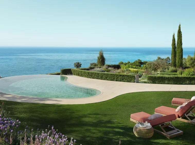 Illustrative communal outdoor pool overlooking the coast in Benalmadena