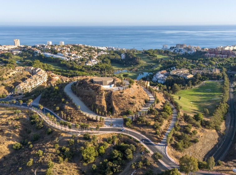 Aerial photograph of the hillside site and surrounding area