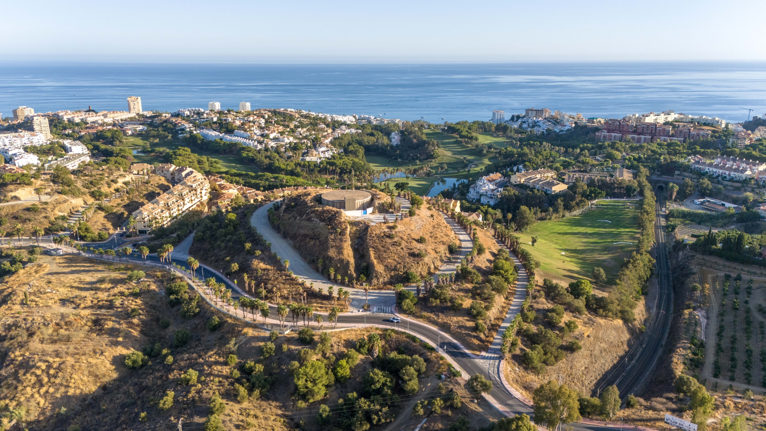 Aerial photograph of the hillside site and surrounding area